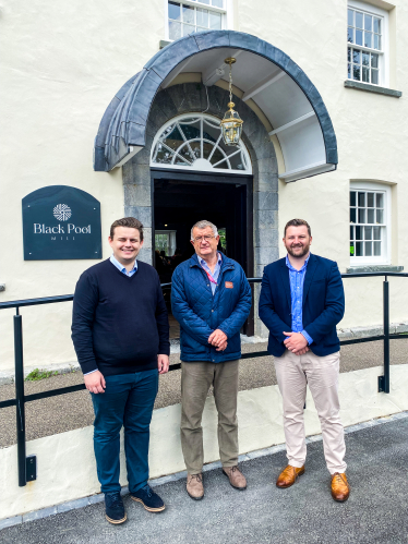 William McNamara, owner and founder of Bluestone National Park Resort, pictured with MSs Tom Giffard and Samuel Kurtz